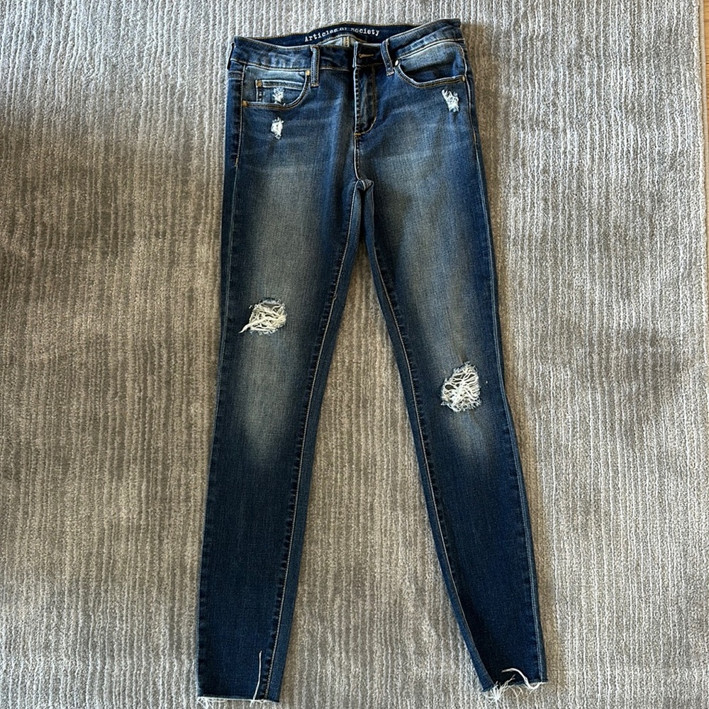 Skinny ripped jeans